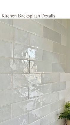 the kitchen backsplash details are white and clean