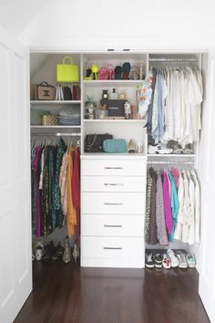 an organized closet with clothes and shoes