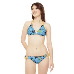 Dive into the rhythm of your favorite music with the Women's Sky Blue Splash Strappy Bikini! Made with 82% microfiber polyester and 18% spandex, it offers comfort and flexibility for dancing the night away. Its medium-weight fabric, removable cups, and adjustable elastic straps ensure the perfect fit. Choose from 7 vibrant strap colors to match your festival vibe. Welcome to an electrifying blend of style and fun, because nothing screams festival season like our Sky Blue Splash Strappy Bikini! # Adjustable Blue Nylon Swimwear, Blue Nylon T-back Swimwear, Blue Fitted T-back Swimwear, Fitted Blue T-back Swimwear, Tank Top Swimsuit, Edm Fashion, Puffer Jacket Men, Music Festival Fashion, Festival Gear