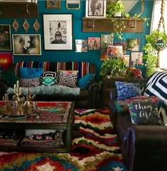 a living room filled with lots of furniture and pictures on the wall above it is an instagram post by lori danielle