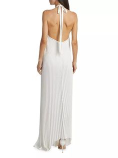 This asymmetric gown from L'Idée is finished withtheatrical pleats and a sleek open back. The sleeveless style features a self-tie halterneck and a sleek open back..Halterneck, back tie closure.Sleeveless.Open back.Concealed back zip closure.100% polyester.Machine wash.Imported.SIZE & FIT.About 48.5-60' from shoulder to hem.Model measurements: 5'10' tall.Model is wearing a US size 4.This asymmetric gown from L'Idée is finished withtheatrical pleats and a sleek open back. The sleeveless style features a self-tie halterneck and a sleek open back.Halterneck, back tie closureSleevelessOpen backConcealed back zip closure100% polyesterMachine washImportedSIZE & FITAbout 48.5-60' from shoulder to hemModel measurements: 5'10” tallModel is wearing a US size 4 Evening Pre-draped Maxi Dress With Pleated Back, Formal Pre-draped Maxi Dress With Pleated Back, Pleated Pre-draped Maxi Dress For Gala, Fitted Floor-length Pleated Dress For Evening, Elegant Summer Evening Dress With Pleated Back, Elegant Floor-length Pleated Dress, Chic Floor-length Pleated Dress, Fitted Floor-length Pleated Cocktail Dress, Fitted Floor-length Pleated Dress For Cocktail