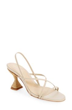 Slender leather straps distinguish a minimalist slingback sandal lifted by a raffia-wrapped flare heel for boho appeal. 3 1/2" heel (size 39) Elasticized slingback strap Leather upper, lining and sole Made in Spain Cream Pointed Toe Slingback Sandals For Summer, Elegant High Heel Slingback Sandals For Vacation, Elegant Beach Slingback Sandals With Open Heel, Cream Slingback Sandals For Spring, Cream Slingback Sandals For Spring Evening, Spring Cream Slingback Sandals, Elegant Slingback Sandals For Vacation In Spring, Elegant Slingback Sandals For Spring Vacation, Chic Beige Slingback Sandals For Summer