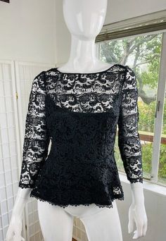 mannequin 4 Vintage Carmen Marc Valvo black lace top with camisole, 8. Good condition. Size; 8 Chic Black Tops With Delicate Lace, Black Lace Tops For Party, Black Delicate Lace Top For Spring, Black Lace Party Tops, Delicate Lace Black Top For Spring, Delicate Lace Black Lace Top For Spring, Delicate Black Lace Top For Spring, Fitted Lace With Lace Trim For Night Out, Chic Evening Tops With Lace Bodice