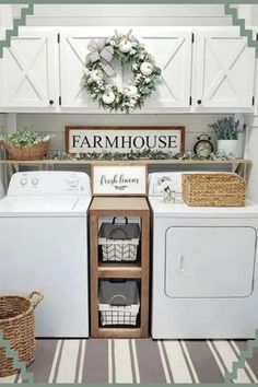 a white washer and dryer sitting next to each other in a laundry room