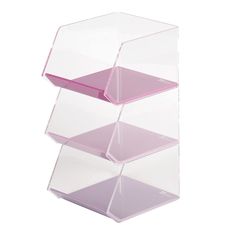 three tier acrylic storage unit with pink shelves on each side and bottom shelf