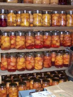 jars filled with different types of food on shelves