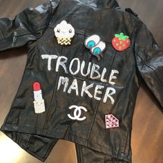 Kids Handpainted ‘Trouble Maker’ Jacket With Patches Trendy Graphic Print Leather Jacket For Spring, Trendy Leather Jacket With Graphic Print, Trendy Leather Jacket With Graphic Print For Spring, Fall Trendy Leather Jacket With Graphic Print, Leather Jacket With Patches, Hand Painted Leather Jacket, Painted Leather Jacket, Jacket With Patches, Jean Jacket Patches