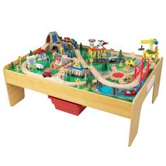 a child's wooden train table with cars and trucks