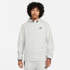 Get 10-out-of-10 style and comfort with the Nike Tech Fleece Pullover Hoodie. This closet staple is designed for lightweight warmth, and features an elongated hem for enhanced coverage and a modern look. Binding along the cuffs and hem provides a clean, finished design, and the three-panel hood offers premium warmth and coverage. Articulated design is extra-comfortable. Ribbed neck gives you additional coverage and a modern look. Features a three-panel hood. 66% cotton/34% polyester. Imported. Nike Sportswear Tech Fleece, Tech Fleece Hoodie, Hoodies Men Pullover, Nike Tech Fleece, Nike Tech, Jeans For Short Women, Tech Fleece, Nike Hoodie, Fleece Joggers