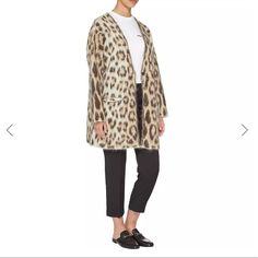 Loewe Leopard Print Luxe Cardigan. 65% Mohair, 27% Polyamide, 8% Wool. Made In Italy. Authentic. Sold Out. Loewe Button-Front Leopard-Print Mohair Oversized Cardigan. Front Pockets. Long. Cozy Chic. *No Brand/Size Tag Attached But Care Tag Is Intact With Style # Buttons Are Branded. As This Is An Oversized Piece, It Can Work For Many Sizes Depending On Preferred Fit! Please See Measurements: Arm Length: 19” Length From Shoulder To Bottom: 29” Pit To Pit: 23” Inches Good Pre Owned Condition. Plea Longline Cardigan, Mohair Sweater, Cozy Chic, Care Tag, Button Cardigan, Oversized Cardigan, No Brand, Long A Line, Size Tag