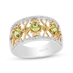 This openwork ring from Enchanted Disney inspired by Tiana is simply a magical look. Sterling silver and 10K gold Larger round green peridot alternate with smaller peridot atop a scroll-patterned center Sparkling round diamonds line the top and bottom edges 1/5 ct. t.w. of diamonds ©Disney Ornate Ring, Scroll Pattern, Green Peridot, Disney Inspired, 10k Gold, Enchanted, Round Diamonds, Sterling Silver Rings, Sparkle