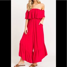 Flattering, Flowy And Fun, What Else Can You Say About About This Gorgeous Red Ruffle Jumpsuit! Featuring Pockets, Off The Shoulder Ruffle Detail, Smocked Waist, And Ruffle Tiered Relax Fit Bottoms. Perfect For Lounging, Brunching, Trips To The Beach, And All Your Favorite Weekend Activities. Fits True To Size Model Is Wearing A Size Small Fabric: 100% Rayon Casual Red Ruffled Jumpsuits And Rompers, Casual Red Jumpsuits And Rompers With Ruffles, Chic Red Strapless Jumpsuit For Spring, Chic Red Jumpsuit With Ruffles, Red Chic Jumpsuits And Rompers With Ruffles, Off The Shoulder Jumpsuit, Tie Dye Sweats, Black And White Romper, Pleated Jumpsuit