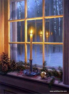 a window sill decorated with candles and evergreens