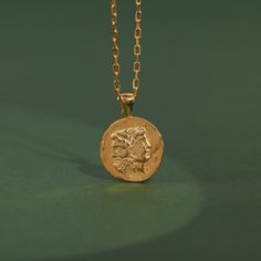 Myhalogical Janus Roman necklace in gold plated or oxidized silver for minimalist gift, Elegant coin pendant for best friend in 14K gold Our handmade necklaces are so versatile and make the perfect gift idea for women of all ages. Whether you're shopping for a teen, young adult, or mature woman, these pendants are sure to impress. They are perfect for birthdays, anniversaries, holidays, or any other special occasion. Their elegant, slim shape complements any outfit, and their minimalist design ensures they'll never go out of style. Crafted from 925 Sterling silver, 10K Gold, 14K Gold and 18K Gold, these jewels are of the highest quality and you can be confident they will last. The 14K Gold material also means they are hypoallergenic, so they won't irritate sensitive skin. - Finish: Oxidize Roman Necklace, Gift Idea For Women, Minimalist Gifts, Art Pendant, Oxidized Silver, Coin Pendant, Gold Plated Silver, Gold Material, Handmade Necklaces