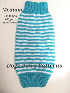 a blue and white knitted dog sweater with stripes on the bottom, front and back