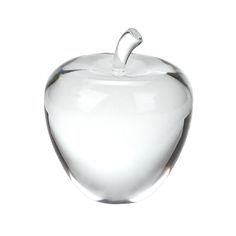 an apple shaped glass object on a white background