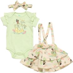 Dress your little girl in this adorable Disney Princess outfit and get ready for a magical day. This 3-piece set includes a soft green bodysuit featuring artwork of Tiana from The Princess and the Frog with the words "Dreams Come True." A cute jumper and matching headband complete the outfit that has your little girl looking as pretty as a princess. Green Cotton Sets With Character Print, Playful Green Sets With Character Print, Green Cartoon Print Sets For Spring, Green Fitted Sets For Playtime, Disney Princess Babies, Yellow Bodysuit, Disney Princess Outfits, Disney Princess Tiana, Cute Jumpers