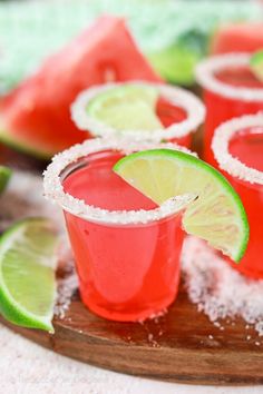 watermelon margaritas are garnished with sugar and lime