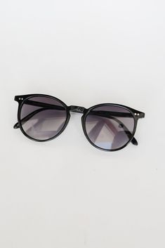 Sunny days just wouldn't be the same without an essential accessory like the Perfectly Iconic Black Round Sunglasses! These essential summer sunglasses have a round shape with black frames! Save your eyes the strain and harmful rays with a pair of sunglasses that never compromise style or function. Round Shape Black Frames One Size | Frame Length 5.5" | Height 1.75" | Temple Arm Length 5.25" Casual Round Sunglasses With Uv Protection, Casual Round Sunglasses With Mirrored Lenses, Trendy Round Sunglasses With Uva Protection, Casual Round Sunglasses For Beach, Casual Cat Eye Sunglasses With Uv Protection, Casual Plastic Round Frame Sunglasses, Trendy Round Frame Sunglasses With Anti-reflective Coating, Trendy Round Frame Anti-reflective Sunglasses, Black Plastic Cat Eye Sunglasses For The Beach