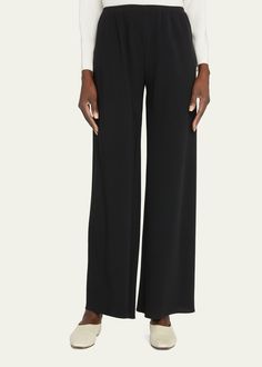 "Find THE ROW Gala Wide-leg Crepe Pants on Editorialist. THE ROW \"Gala\" crepe pants. High rise. Elastic waistband. Flat front. Wide legs. Pullon style. Triacetate/polyester. Dry clean. Made in Italy." 4-way Stretch Wide Leg Trousers With Elastic Waistband, Evening Wide Leg Trousers With Elastic Waistband, Wide Leg Trousers With Elastic Waistband For Evening, Evening Wide-leg Pants With Elastic Waistband, Elegant Wide-leg Pants With 4-way Stretch, Elegant Stretch Pants With Elastic Waistband, Chic Evening Pants With Elastic Waistband, Chic Pants With Elastic Waistband For Evening, Elegant Evening Pants With Elastic Waistband