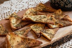 small pieces of bread on a wooden cutting board