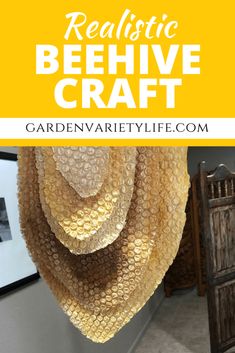 the words realistic beehive craft hanging on a wall