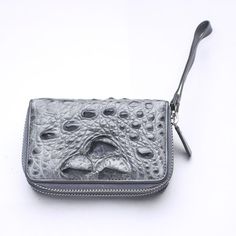 Light Gray genuine crocodile backbone skin leather wallet ~brand new     If you're on the hunt for something compact and beautiful, choose our Light Gray Crocodile Backbone Skin Wallet. Ideal for the modern woman with the busiest of lifestyles, it allows you to introduce glamour into your everyday.      Our craftsmen used the finest crocodile backbone skin - renowned for its deep and exquisite markings. This is then stitched by hand and finished to the highest quality, guaranteeing a long and ch Cheap Women's Wallets With Crocodile Pattern, Luxury Black Crocodile Pattern Wallet, Luxury Alligator Leather Wallet With Crocodile Pattern, Cheap Crocodile Pattern Wallets, Luxury Brown Crocodile Pattern Wallets, Fashionable Accessories, Leather Wallets, Modern Woman, Light Gray