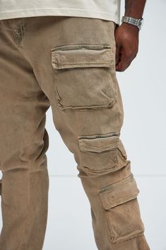 Available In Taupe. 5 Pocket Body Stacked Skinny Flare Fit Zip Fly Button Closure Cargo Square Pockets Open Hem Disclaimer: Due To The Distressing Process, Each Garment Is Unique. Disclaimer: To Keep The Aesthetic Of This Garment, Please Follow The Care Instructions Carefully. 88% Cotton, 8% Polyester, 4% Spandex Imported | Mens Three Cargo Stacked Skinny Flare Jeans in Taupe size 30 by Fashion Nova Distressed Fitted Cargo Jeans, Casual Khaki Cargo Pants With Button Closure, Casual Cotton Cargo Jeans With Button Closure, Fitted Khaki Cargo Jeans Casual, Casual Fitted Khaki Cargo Jeans, Casual Fitted Washed Cargo Jeans, Fitted Khaki Cargo Jeans, Taupe Fashion, Flare Jeans