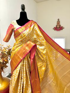 Exclusive Banarasi full  design saree with beautiful Kanchi Boarder ! Blouse is ready to wear designer blouse that fits 32 to 40 blouse has beautiful Kanchi boarder ! beautiful combination of yellow and pink ideal for parties and weddings special occasions. Yellow Art Silk Blouse With Zari Weaving, Designer Yellow Paithani Silk Saree, Yellow Banarasi Silk Bollywood Blouse, Yellow Bollywood Banarasi Silk Blouse, Yellow Banarasi Silk Blouse With Pallu, Yellow Self Design Paithani Silk Blouse Piece, Yellow Paithani Silk Blouse Piece With Self Design, Yellow Unstitched Paithani Silk Blouse Piece, Yellow Paithani Silk Traditional Wear With Unstitched Blouse