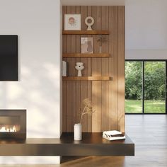 a modern living room with wood paneling and fireplace