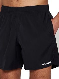 92% Polyamide, 8% Elastane Made in Italy Designer Model Number: J47SP0106J20006 Designer Colour: 001BLACK Relaxed Fit Sports Bottoms With Logo Waistband, Black Bottoms With Logo Waistband In Short Length, Logo Waistband Summer Shorts, Black Bottoms With Logo Waistband, Short Length, Black Summer Bottoms With Comfort Waistband, Casual Black Bottoms With Logo Waistband, Casual Summer Bottoms With Logo Waistband, Black Casual Shorts With Logo Waistband, Short Athleisure Bottoms With Logo Waistband