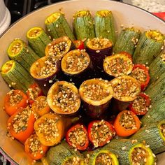 an assortment of vegetables are arranged in a bowl on the stove top, ready to be cooked