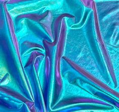 an image of blue and purple material that appears to be metallic or something shiny,