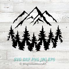 mountains and trees svg dxf file is shown on a white wood background