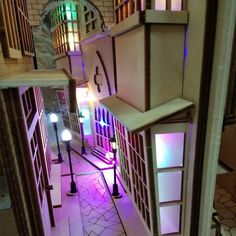 an overhead view of a building with purple lighting