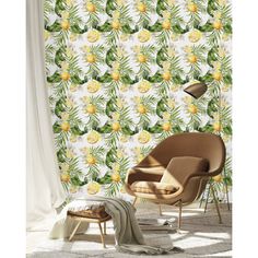 a chair and ottoman in front of a wallpaper with yellow flowers on the background