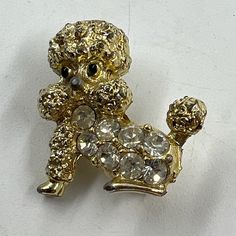 Nemo Pierre the Poodle rhinestone dog pin brooch  Vintage circa 1920s Measurements: .75" tall .50" wide Condition: good pre owned condition  Smoke free pet friendly home Brooch Vintage, Dog Pin, Rhinestone Brooches, Pin Brooch, Vintage Brooches, Pet Friendly, Brooch Pin, Brooches, Gold Tones