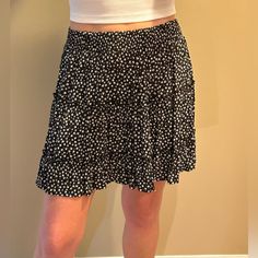 Brand New Condition (Never Worn) Forever 21 Tiered Black And White Floral Skirt, Size Large. This Skirt Is A Lightweight Material. It Has A Smocked Waistband And It Has Two Tiers With Ruffles. You Can Definitely Dress This Skirt Up Or Down And It Will Be A Staple In Your Spring/Summer Wardrobe! Trendy Lined Mini Skirt For Brunch, Trendy Lined Skirt For Brunch, Trendy Skirt With Elastic Waistband, Trendy Mini Skort With Flowy Skirt, Trendy Flowy Mini Skort, Flowy Mini Skirt With Elastic Waistband For Brunch, Trendy Mini Skort, Trendy Flowy Lined Mini Skirt, Pleated Mini Skirt For Brunch