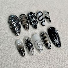 Upgrade your nail game with our Black White Press On Nails, Gothic Punk Rock Nails, Y2K Press On Nails For Goth Girls. Perfect for Gothic, Punk, and Y2K styles, these nails are cool and edgy. Say goodbye to boring nails, and hello to confident self-expression. Save time and money with easy application that takes only 10 minutes. No need to go to the salon - get Gothic Punk Rock Nails or Goth Y2K Press On Nails in the comfort of your own home. Material: Acrylic Package Included : 10 Fake Nails 24 Punk Rock Nails, Nails Gothic, White Press On Nails, Boring Nails, Rock Nails, Nails Y2k, Black Acrylic Nails, Punk Nails