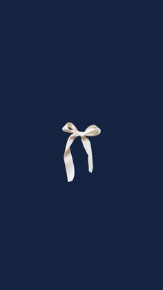 a white ribbon on a dark blue background