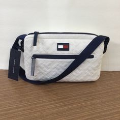 Tommy Hilfiger Crossbody Bag /Camera Bag Light Weight Cream Color Nwt White Tommy Hilfiger Bags For Everyday Use, Tommy Hilfiger Tan Shoulder Bag For Travel, Tommy Hilfiger Shoulder Bag For Travel, Tommy Hilfiger Crossbody Shoulder Bag For Travel, Tommy Hilfiger Crossbody Travel Bag, Tommy Hilfiger Rectangular Shoulder Bag With Adjustable Strap, Tommy Hilfiger Beige Bags, Tommy Hilfiger Shoulder Bag With Adjustable Strap, Tommy Hilfiger Tote Bags