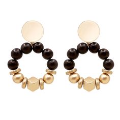 Introducing our lightweight and stylish statement earrings, the perfect accessory for your next getaway. These earrings feature a combination of round and geometric shaped gold wooden beads that are sure to make a statement. The large circle gold earring post adds a modern touch. These earrings are perfect for adding a touch of elegance to any outfit. Whether you're hitting the beach or exploring a new city, these earrings are sure to be your new go-to accessory. Lightweight and versatile, they' Affordable Statement Jewelry With Wooden Beads, Earring Post, Gold Earring, New City, Wooden Beads, Post Earrings, Statement Earrings, Gold Earrings, Jewelry Collection