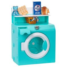 a blue toy washer sitting on top of a white floor