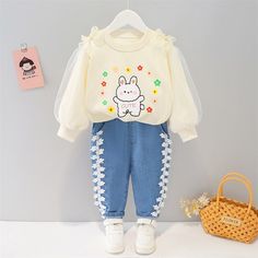 Description Spring / Autumn Baby/Toddler Rabbit Cartoon 2 Pcs Clothes Set - Long Sleeves T+ Pants Perfect for kids who love Bunnies Gender: Girls Perfect as birthday gifts Material: Cotton Collar: O-neck Age range: 6 months to 4 years old Age T-Shirt Length Pants Length 6 months 34 cm | 13.38 in 45 cm | 17.71 in 9 Months 35 cm | 13.7 in 46 cm | 18.1 in 12 mth 36 cm | 14.1 in 48 cm | 18.89 in 18 mth 38 cm | 14.96 in 51 cm | 20.07 in 24 Months 39 cm | 15.3 in 52 cm | 20.4 in 3 years 40 cm | 15.74 Childrens Clothes Girls, Fashionable Baby Clothes, Shirt Pant Set, Rabbit Cartoon, Clothes Set, Modern Outfits, Kids Sweater, Pant Shirt, Suit Fashion