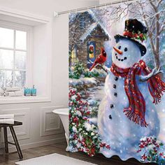 a shower curtain with a snowman on it