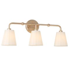 three light bathroom fixture with white shades on the side and gold metal finish, in an antique