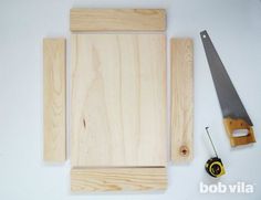 the tools needed to make a diy wood cutting board are laid out on a white surface