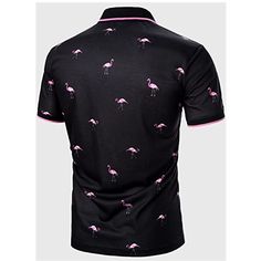 a black polo shirt with pink flamingos on the front and back, all over