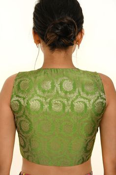 Elevate your ethnic look with this stunning Green Sleeveless Brocade Silk Blouse featuring a stylish V Neckline. Perfect for pairing with a saree or lehenga. Festive Anarkali Saree, Sleeveless Elegant Lehenga For Festivals, Elegant Sleeveless Lehenga For Festivals, Sleeveless Art Silk Traditional Wear With Cutdana, Designer Wear Sleeveless Art Silk Saree, Elegant Lehenga With Unstitched Blouse And Sleeveless Design, Bollywood Style Sleeveless Traditional Wear, Elegant Sleeveless Designer Choli, Bollywood Style Sleeveless Saree For Diwali