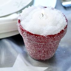 a candle that is sitting on top of a table